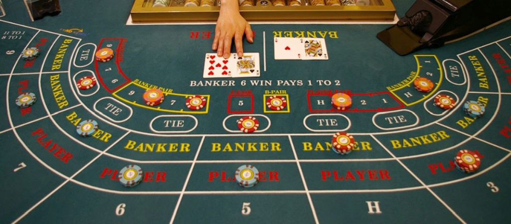 Playing a hand of baccarat at a landbased casino